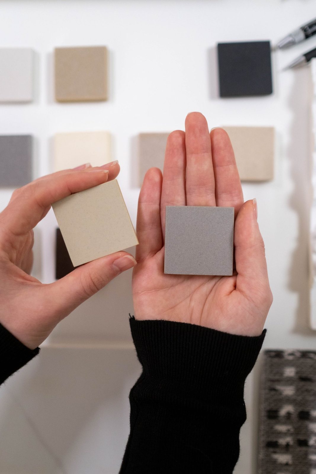 Designer comparing finish sample chips